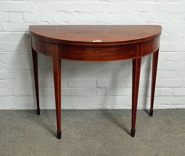 A George III inlaid mahogany semi-elliptic card table, on tapering square supports, 97cm wide x 75cm high.