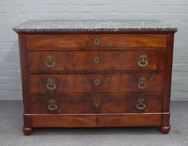 A 19th century French commode with rectangular marble top over gilt metal mounted walnut base with four long drawers, 130cm wide x 92cm high.