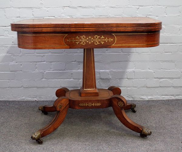 A late George III brass inlaid rosewood 'D' shaped card table on tapering square column and four downswept supports, 94cm wide x 76cm high.