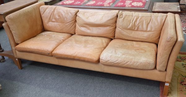 Stowey Dansk Design; a tanned leather square back three seater sofa, on block supports, 205cm wide x 65cm high.