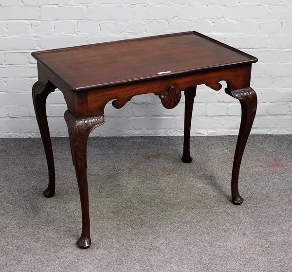 An 18th century style Irish mahogany silver table with dished rectangular top on acanthus capped cabriole supports, 80cm wide x 69cm high.