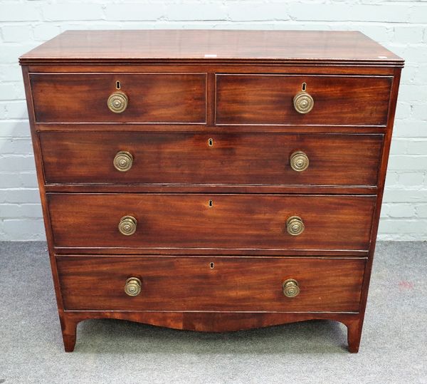 A George III mahogany chest of two short and three long graduated drawers on bracket feet, 101cm wide x 99cm high.