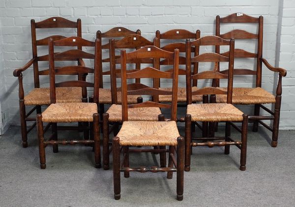 A matched set of eight 19th century ash ladder back dining chairs on turned supports, to include a pair of carver chairs, (8).