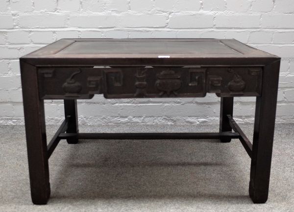 A 19th century Chinese rosewood and Jichimu (chicken-wing wood) rectangular low table with carved and shaped frieze on block supports, 77cm wide x 48c