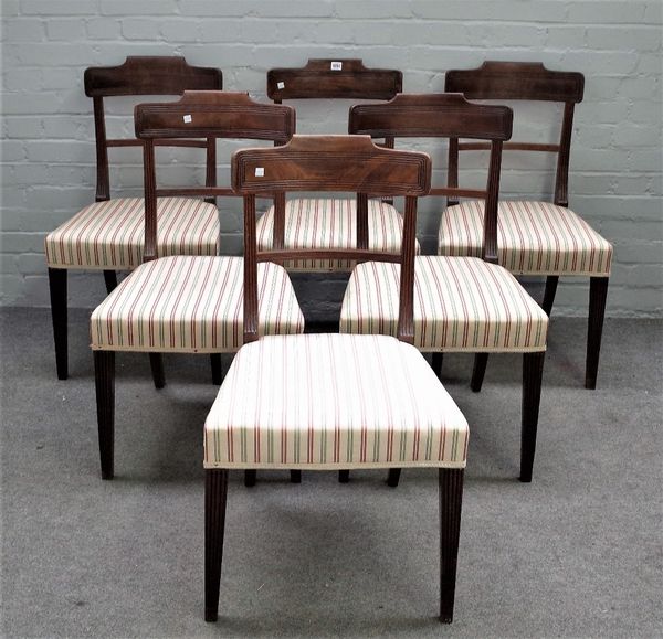 A set of eight late George III mahogany bar back dining chairs on tapering square supports, 49cm wide x 86cm high, (8).