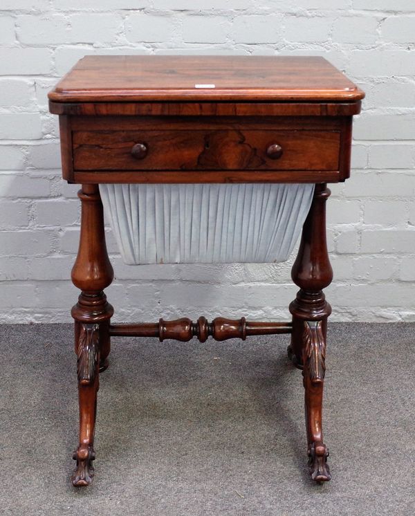 An early Victorian rosewood sewing/games table, the fold out rectangular top over frieze drawer and wool box on four downswept supports, 53cm wide x 7