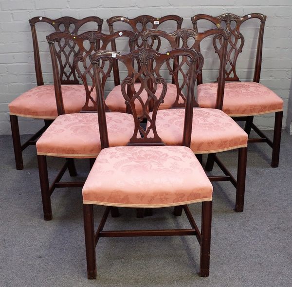 A set of eight George III style mahogany dining chairs with pierced back on block supports, 57cm wide x 95cm high.