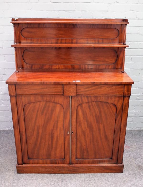 A Victorian mahogany chiffonier with double shelf back over pair of drawers and cupboards on plinth base, 102cm wide x 139cm high.