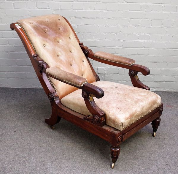 A William IV mahogany leather upholstered open arm easy chair with adjustable back and integral foot rest, 71cm wide x 106cm high.