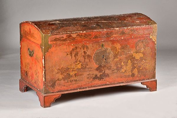 An early 18th century Chinese export domed topped scarlet lacquered trunk with original embossed paper lined interior, on bracket feet, 120cm wide x 7