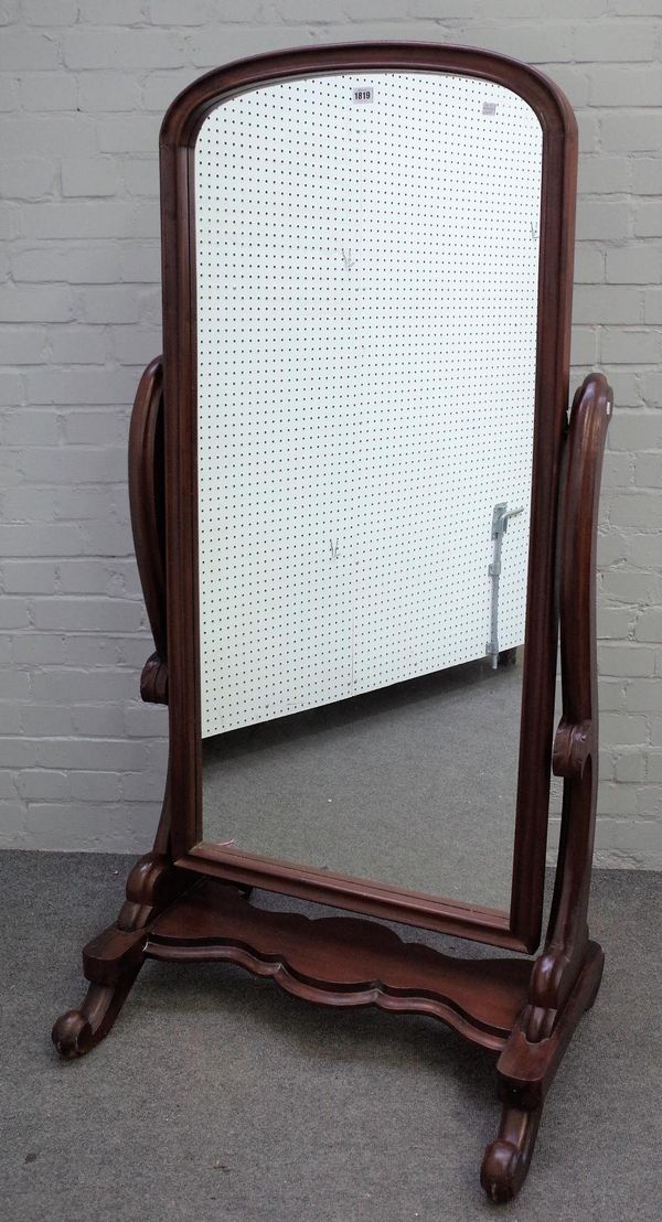 A mahogany framed cheval mirror, with arched top frame and scroll supports, 78cm wide x 155cm high.