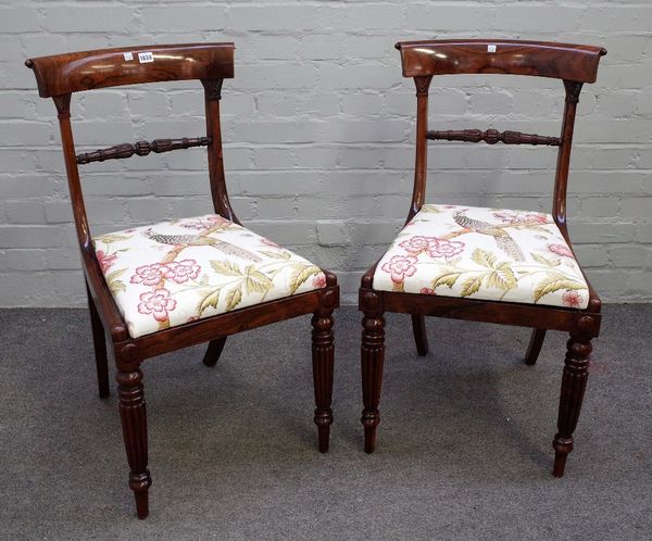 A pair of William IV rosewood side chairs, with lappet turned waist rail, on tapering reeded supports, 46cm wide x 84cm high x 54cm deep.