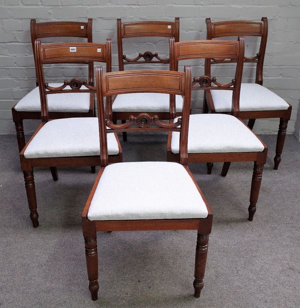 A set of six 19th century mahogany bar back dining chairs, with pierced crest rail, on turned supports, 46cm wide x 83cm high.