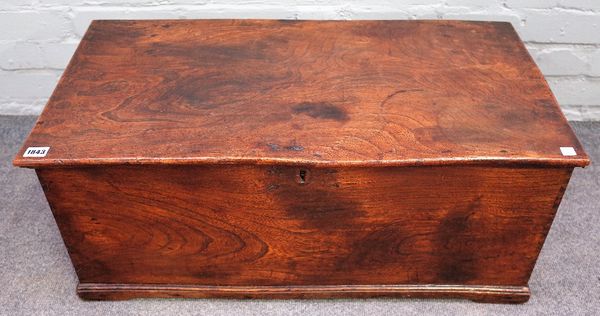 A George III elm rectangular lift top trunk, with visible dove tails, 78cm wide x 32cm high.