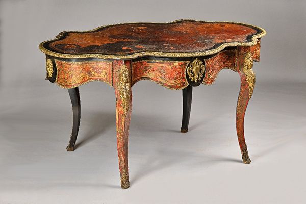 A 19th century gilt metal mounted ebonised boulle work centre table, the serpentine top over frieze drawer on cabriole supports, 150cm wdie x 77cm hig