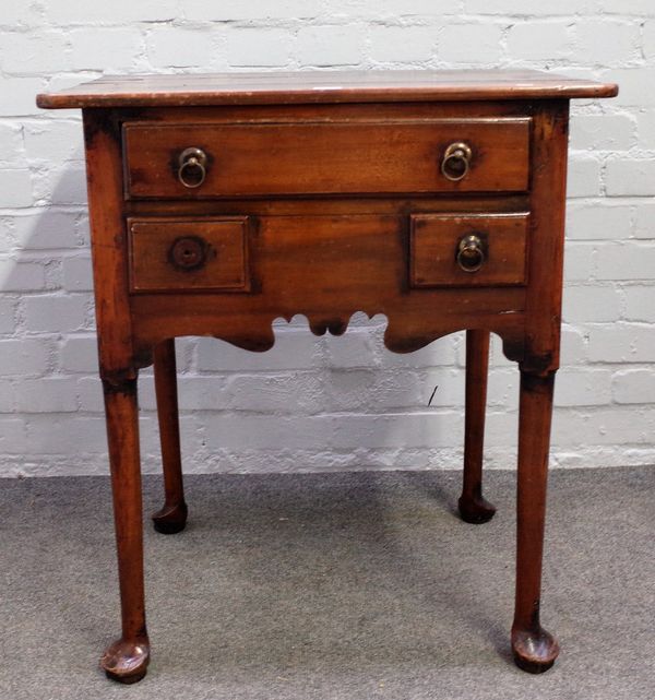 A mid-18th century fruitwood low boy, with three frieze drawers, on club supports, 68cm wide x 75cm high.