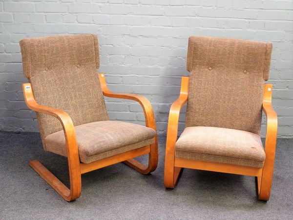 A pair of mid-20th century laminated beech framed open arm easy chairs, after a design by Alvar Allto, 63cm wide x 87cm high, (2).