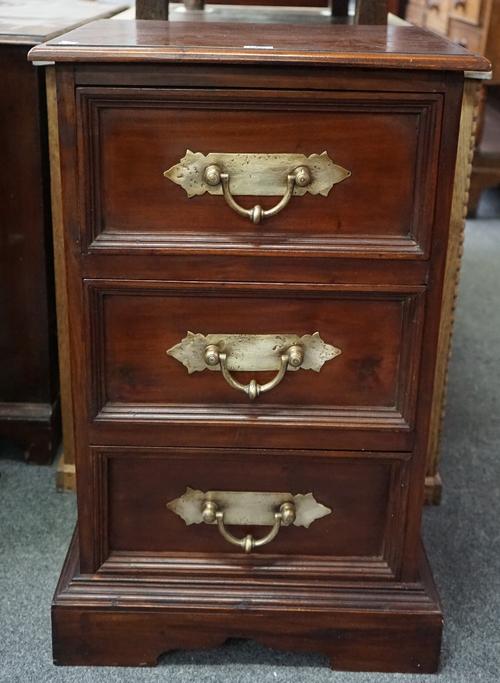 A pair of 20th century hardwood three drawer bedside tables, on shaped plinth base, 51cm wide x 80cm high.