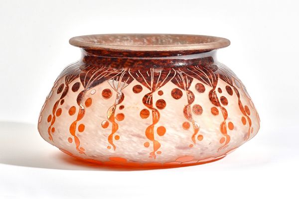 A Charles Schneider `Rubaniers' glass vase, 1920s, the mottled white glass overlaid in orange and brown with stylised hanging garlands, etched mark, `