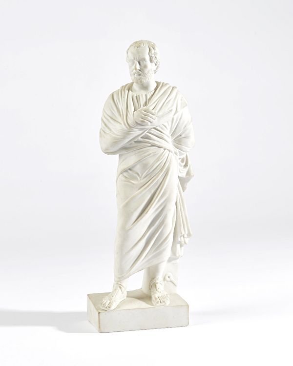 A Giustiniani biscuit figure, Naples, circa 1810, probably depicting a Greek philosopher, the bearded man modelled standing wearing long robes and san