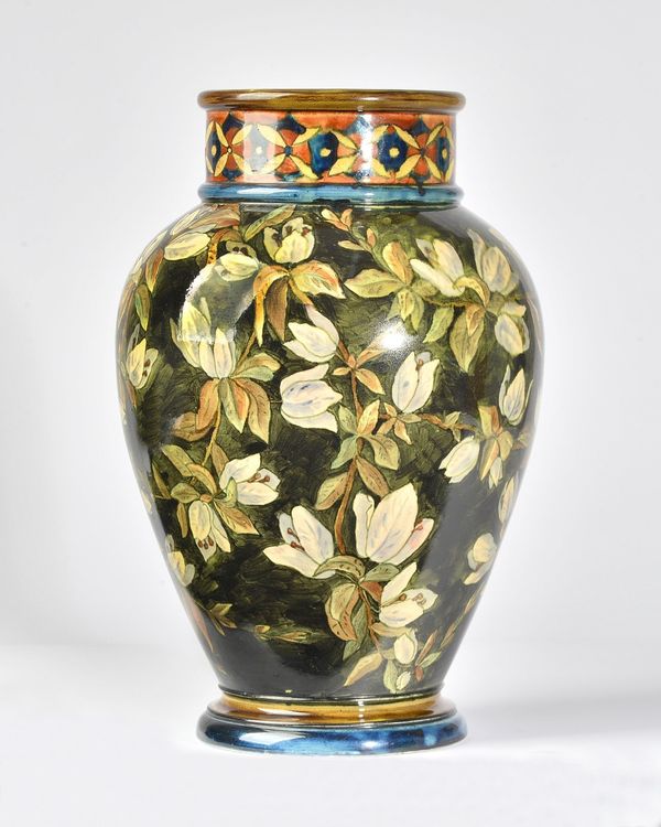 A Doulton faience vase, dated 1877, the ovoid body painted with branches of white three-petal flowers against a deep green washed ground, impressed fa