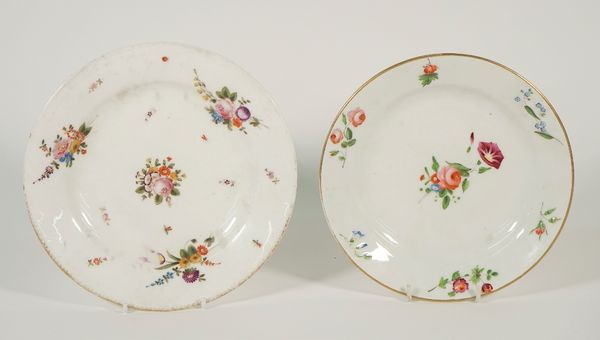 A Swansea porcelain plate, circa 1820, painted in the centre with flowers inside a floral embossed and painted border, impressed mark and trident, 19.