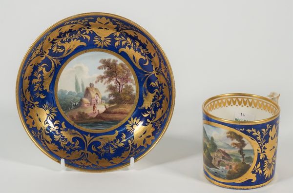 A Derby porcelain blue-ground coffee can and saucer, circa 1815, painted with named views, Near Buxton, Derbyshire, and Near Breadshall, Derbyshire, a