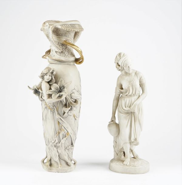 A Copeland parian figure of a Nubian water carrier, dated 1850, modelled by C.Cumberworth, depicting a young African native female, scantily clad, car