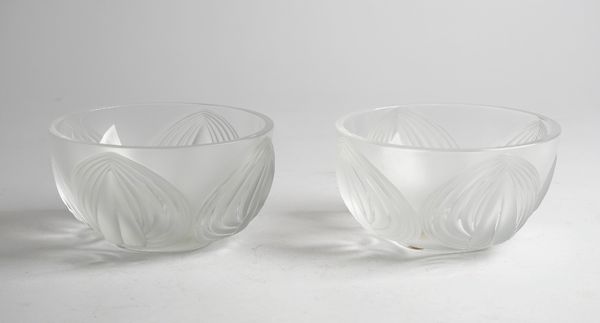 A pair of modern Lalique frosted glass bowls, with foliate moulded decoration, etched 'Lalique France' 15cm diameter, (2).