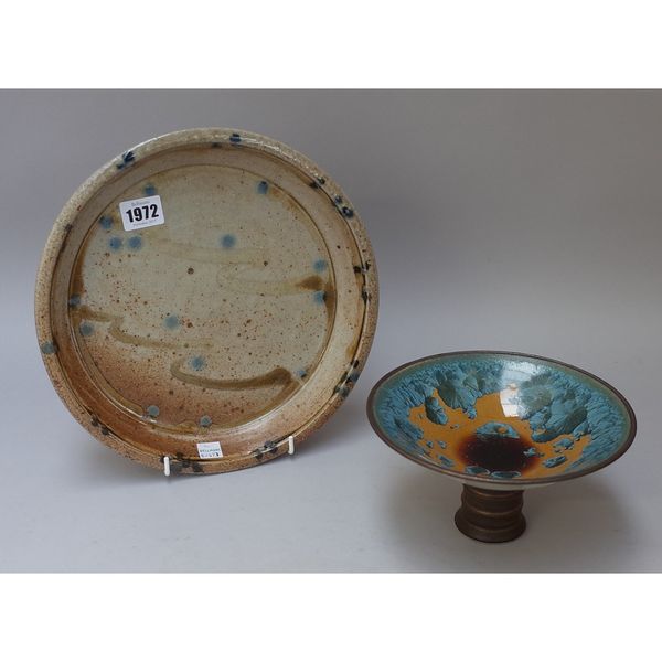 Jane Hamlyn (born 1940), a circular stoneware tray, painted with squiggles and blue dots, 26.5cm diameter; and a Simon Rich footed bowl, 18.5cm diamet