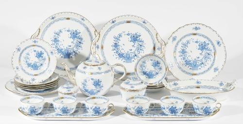 A Herend porcelain part tea service deocrated in the blue Chinese bouquet pattern, comprising; a teapot and cover (15cm high), two graduated sucrier a