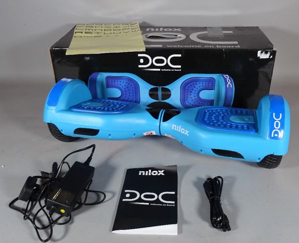 A 'Nilox' balance or hoverboard, boxed.  S2B