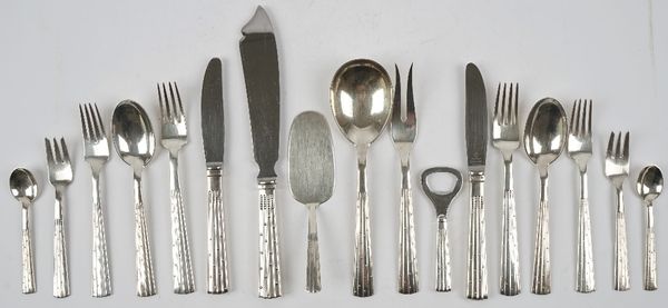 An Orla Vagn Mogensen Champagne Danish part canteen of table flatware for six place settings, comprising; six dessert spoons, six large forks, six med