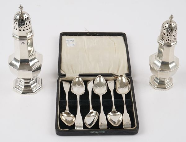 Silver, comprising; an octagonal sugar caster, Sheffield 1934, a small octagonal sugar caster, London 1909 and a set of six fiddle pattern teaspoons,