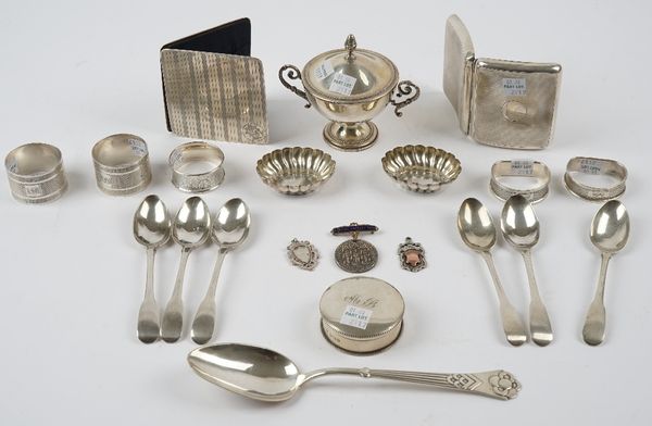 Silver and silver mounted wares, comprising; a rectangular cigarette case, a folding wallet, a pair of shaped oval salts, a set of six fiddle pattern