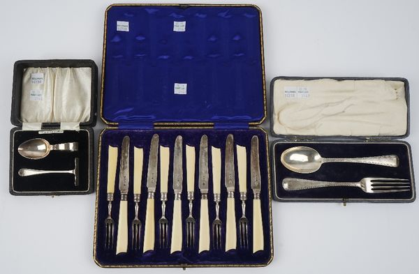 Silver and silver mounted flatware, comprising; a set of six silver bladed dessert knives, having ivory handles, Sheffield 1905 and a set of six silve