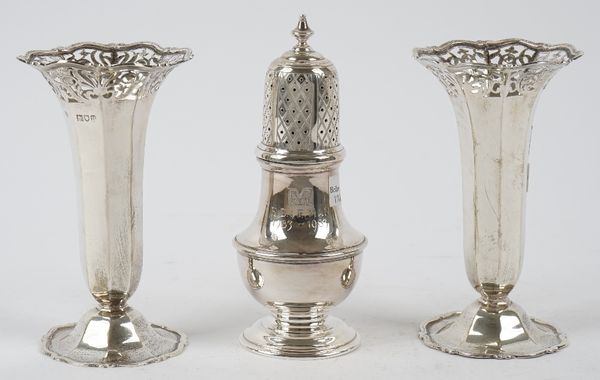 SIlver, comprising: a sugar castor of baluster form presentation inscribed London 1983 and two similar vases each with pierced decoration below a shap