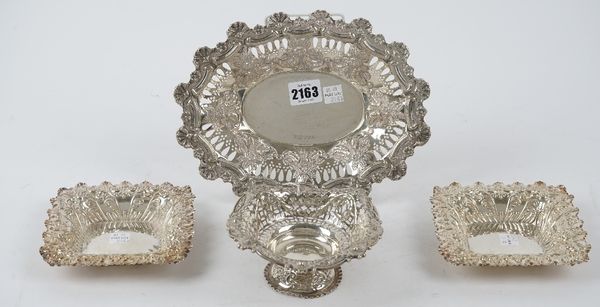 Silver, comprising a shaped oval large bon bon dish with embossed and pierced decoration within a shaped floral and scalloped border, length 24cm, She