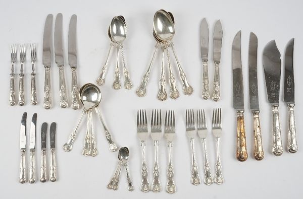 A silver King's pattern canteen of table flatware, the silver comprising all Sheffield; six tablespoons 1965, a pair of serving spoons 1964, twelve de