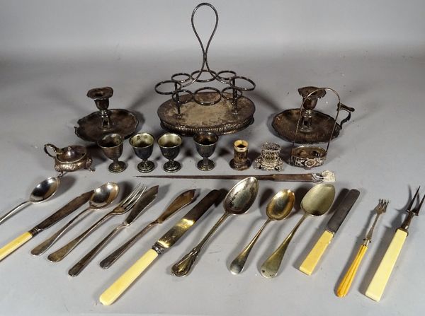 A quantity of early 20th century silver plated items including; flatware, a vinaigrette stand, a pair of chamber sticks and sundry, (qty). S2T