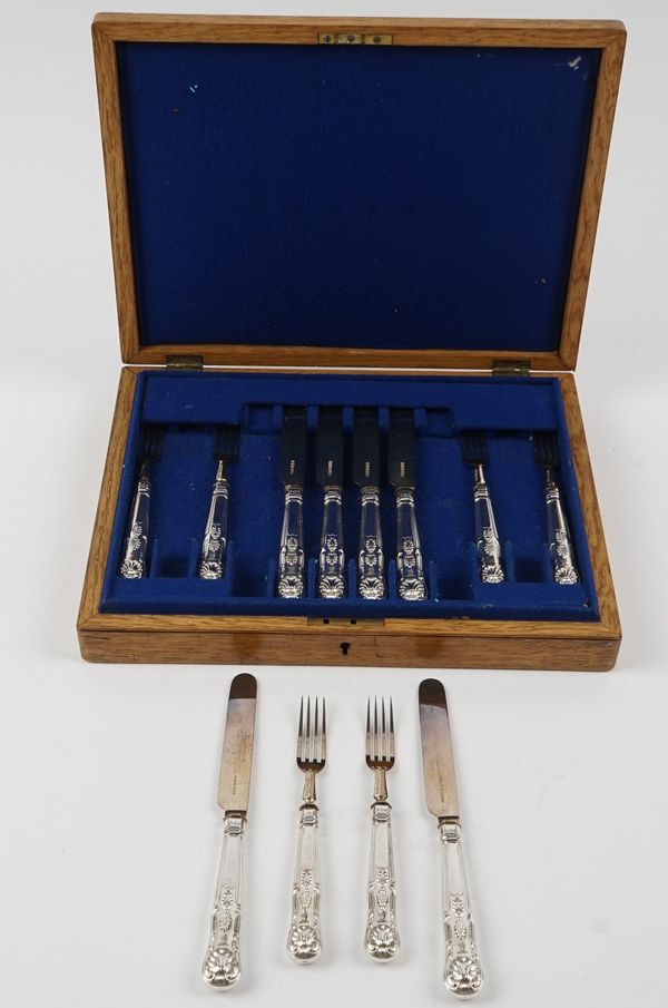 A set of six late Victorian pairs of silver King's pattern dessert or fruit knives and forks, with crest engraved loaded silver handles, Sheffield 189