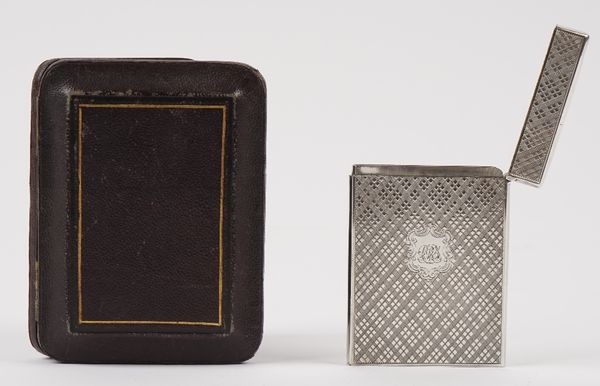 A Victorian Scottish silver rectangular visiting card case, engraved with a central cartouche, centred by a monogram, otherwise with cross hatched dec