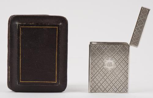 A Victorian Scottish silver rectangular visiting card case, engraved with a central cartouche, centred by a monogram, otherwise with cross hatched dec