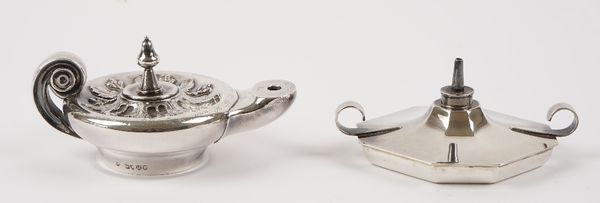 A Victorian silver table lighter, modelled as a classical oil lamp, presentation inscribed, London 1883 and another silver table lighter, of twin hand