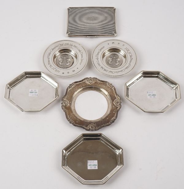 Silver, comprising; a set of four octagonal dishes, Birmingham 1932, a pair of circular Armada style dishes, commemorating Prince Charles and Lady Dia