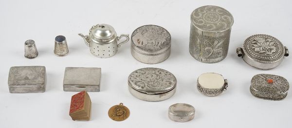 A Swedish rectangular hinge lidded pill box, a group of eight further small boxes, two thimbles, a tea infuser, shaped as a miniature teapot, a devoti