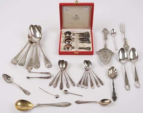 A group of foreign and plated flatware, comprising; nine teaspoons, with a case to hold twelve teaspoons, a set of six Swedish teaspoons, seven Swedis
