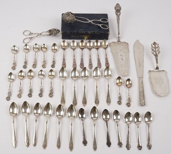 A group of foreign and plated table flatware, comprising; a Norwegian serving slice, a set of twelve Swedish teaspoons, a set of six Swedish coffee sp