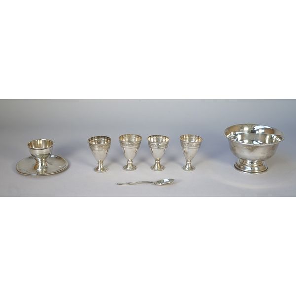 A group of four Turkish spirit tots, each decorated with beaded rims and silver, comprising; a circular bowl, Birmingham 1922, an egg cup and a coffee