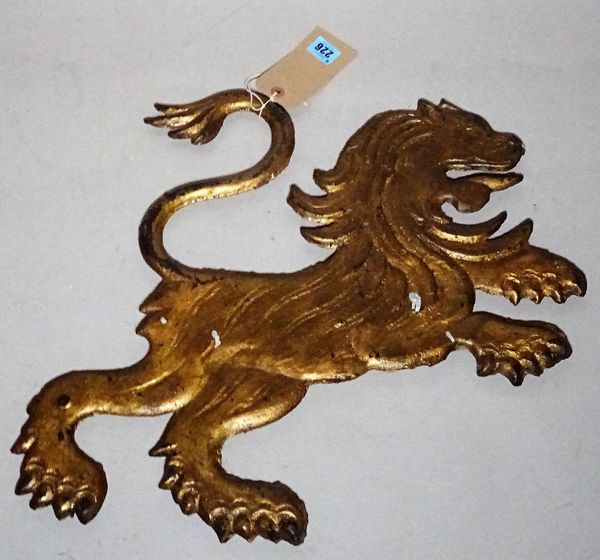 An early 20th century gold painted cast iron flatback figure of a lion, 54cm wide.  D3